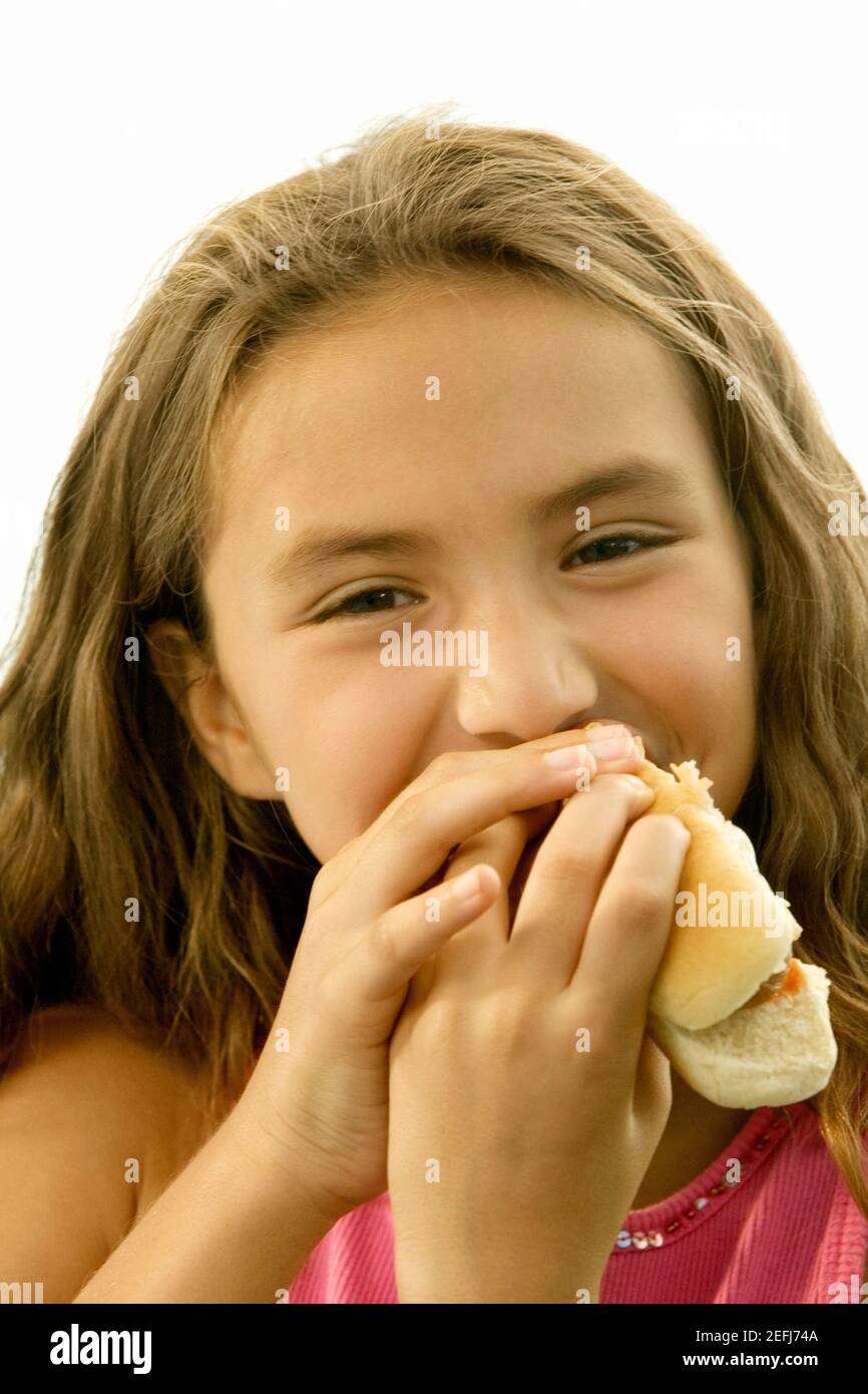 Child eating hot dog hires stock photography and images Alamy