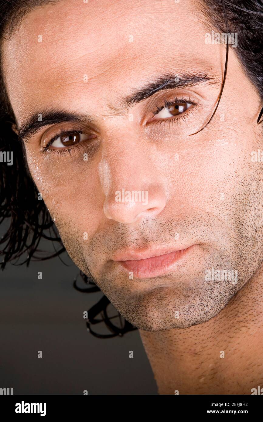 Close-up of a mid adult man looking serious Stock Photo