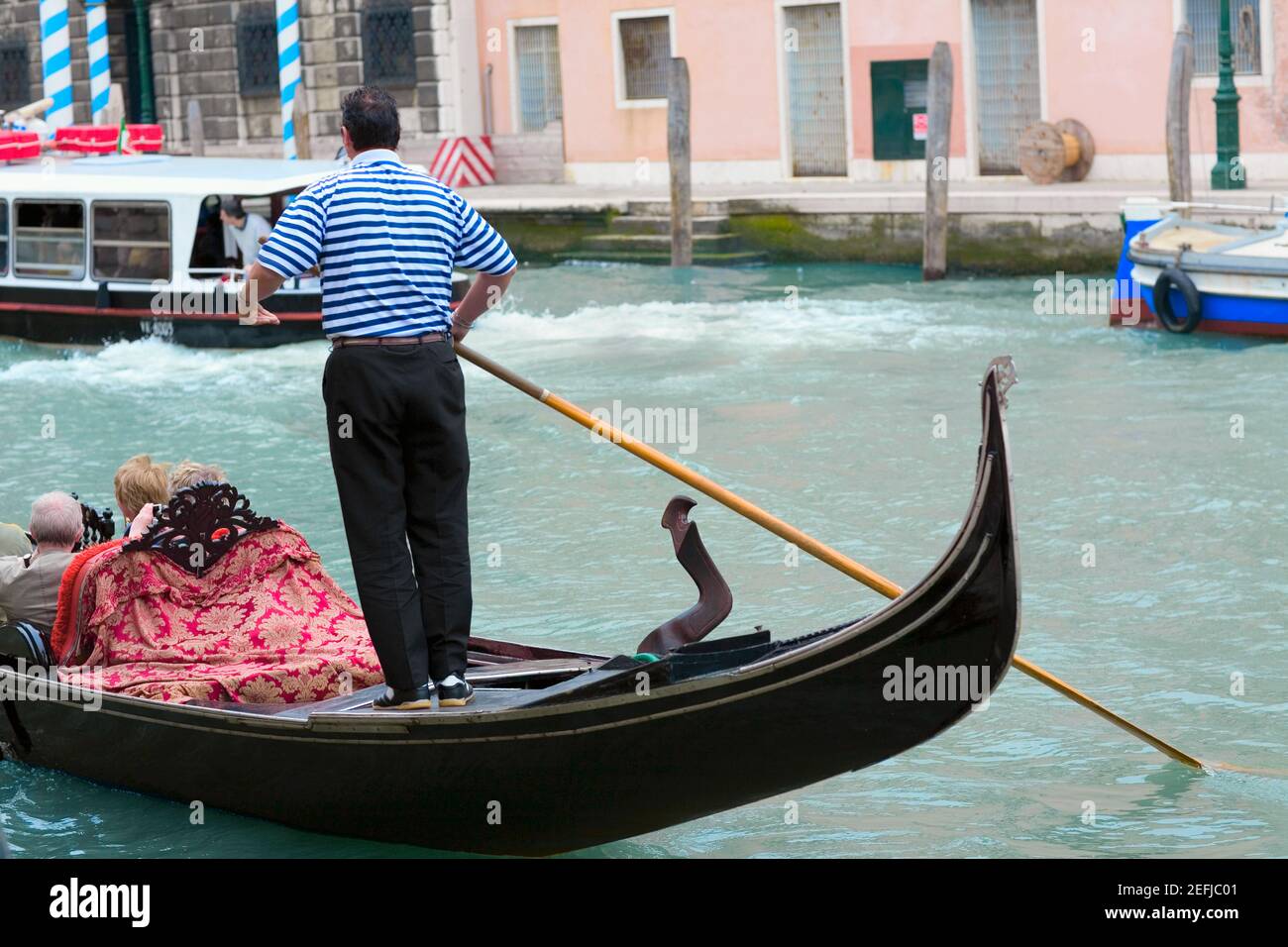 Man rowing gondola on canal hi-res stock photography and images - Alamy