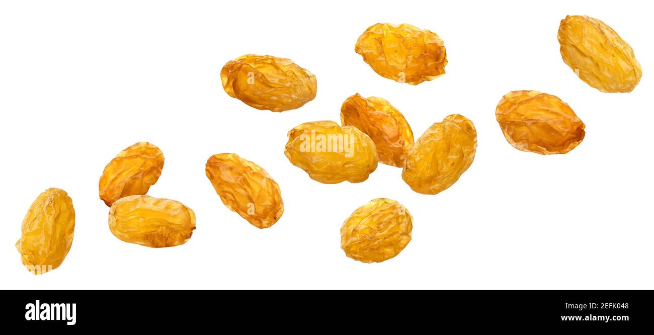 Falling yellow raisins isolated on white background Stock Photo