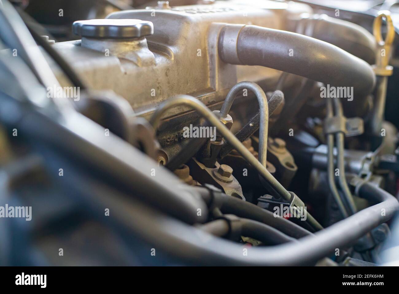 Detail of the diesel injectors in a car engine being repaired Stock Photo Alamy