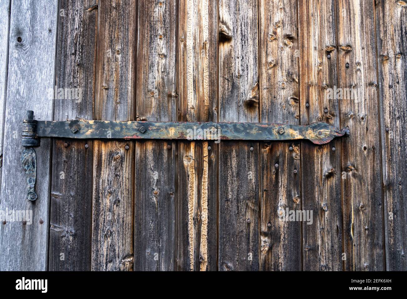 wooden door of a characteristic stable for German moorland sheep in the natural preserve Lueneburger Heide, germany Stock Photo