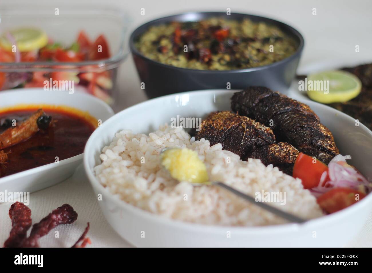 Sardis Rice Kerala meals with red rice, sardines curry, sardine fry and coconut ...