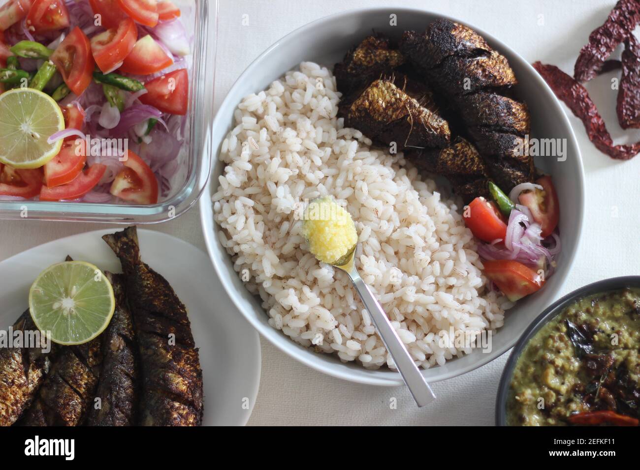 Sardis Rice Kerala meals with red rice, sardines curry, sardine fry and coconut ...