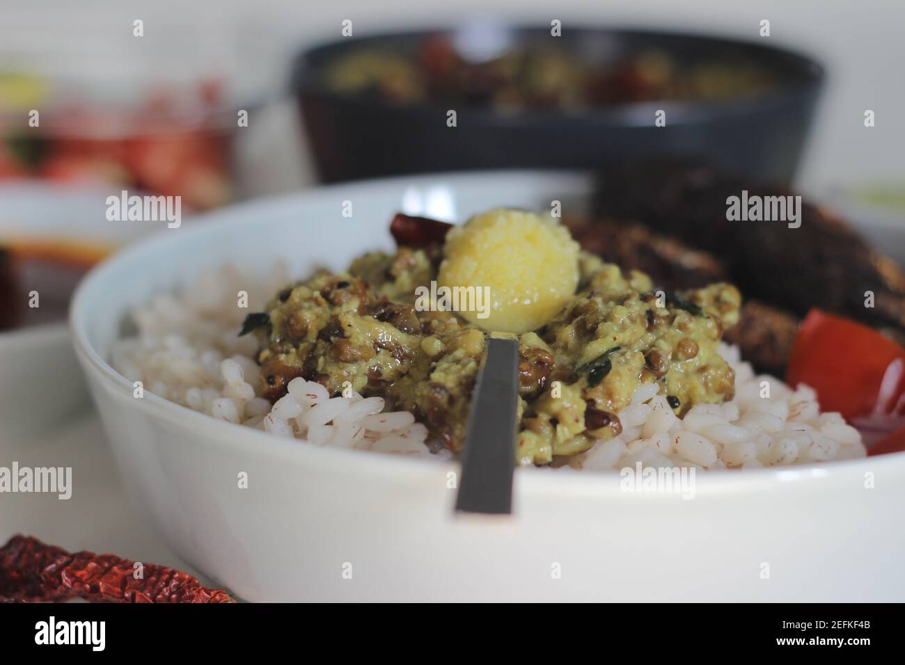 Sardis Rice Kerala meals with red rice, sardines curry, sardine fry and coconut ...