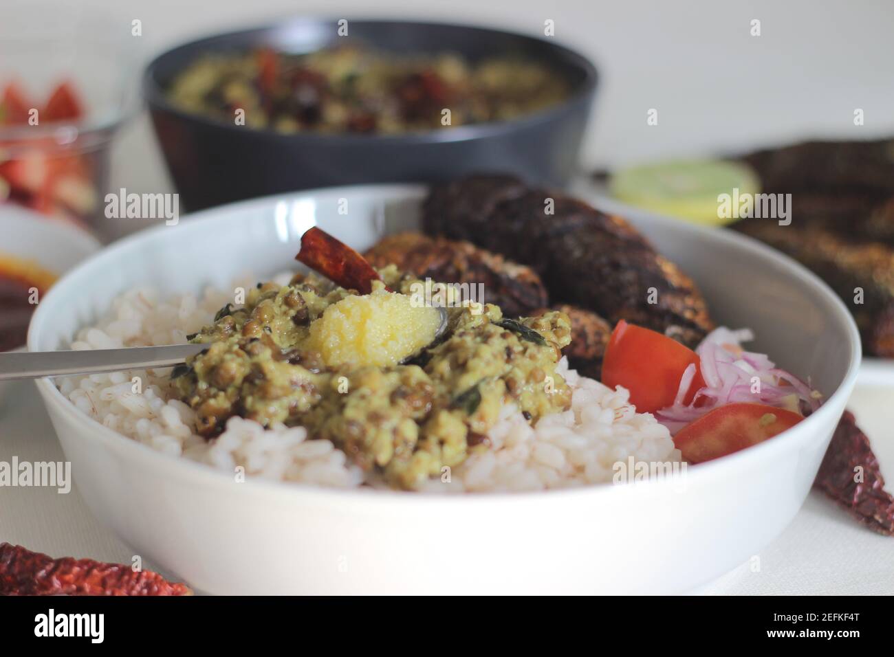Sardis Rice Kerala meals with red rice, sardines curry, sardine fry and coconut ...