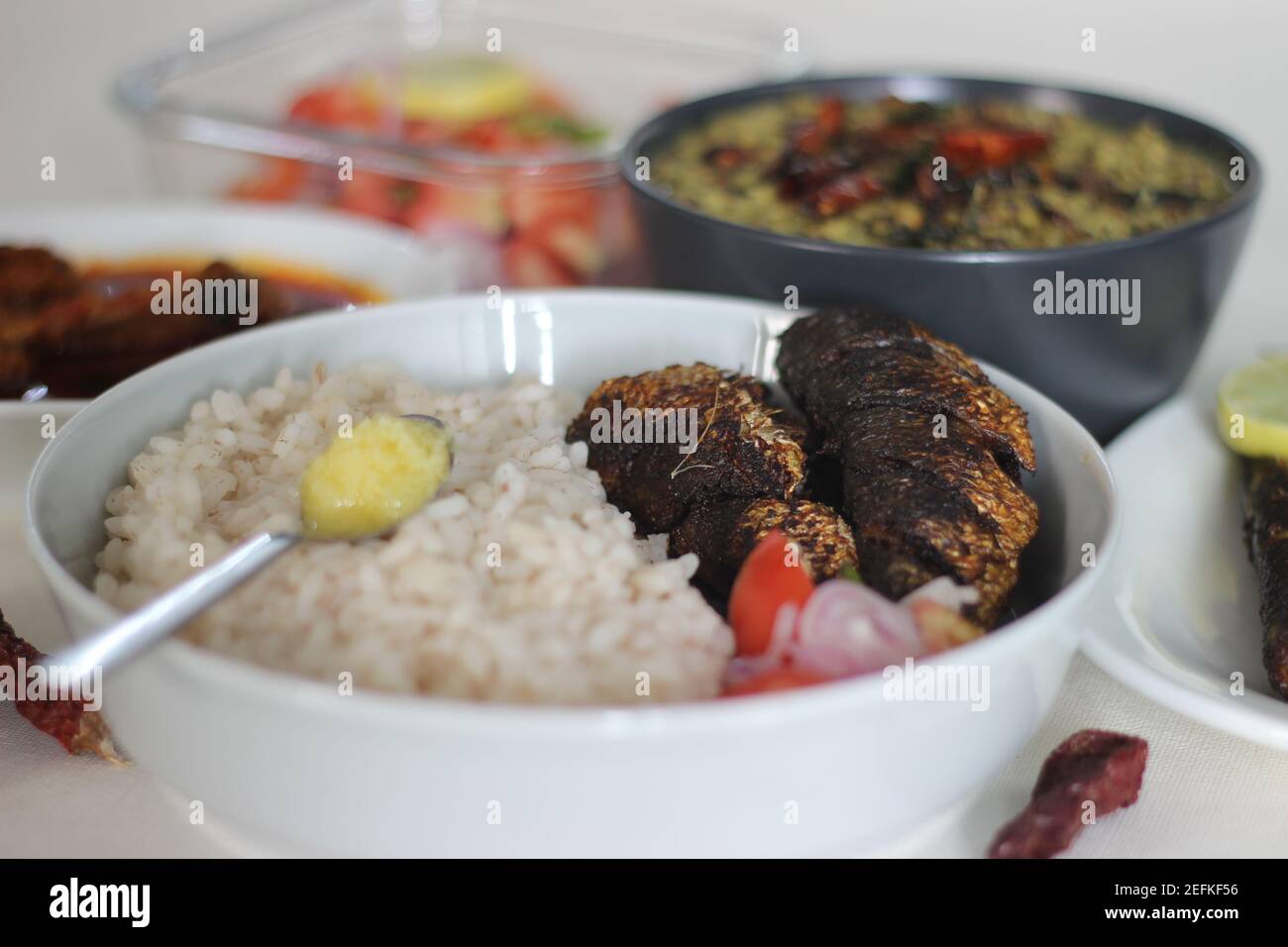 Sardis Rice Kerala meals with red rice, sardines curry, sardine fry and coconut ...