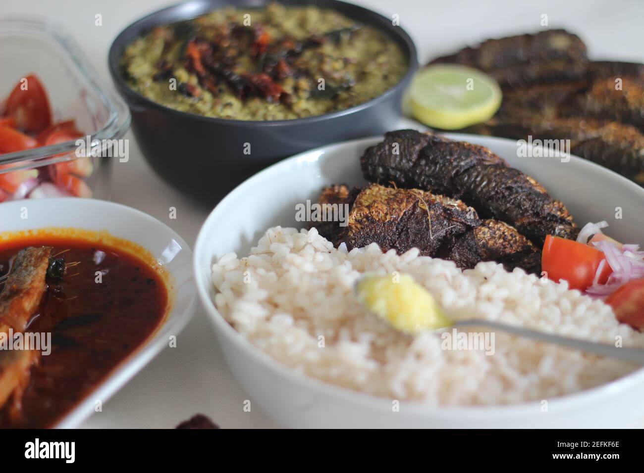 Sardis Rice Kerala meals with red rice, sardines curry, sardine fry and coconut ...