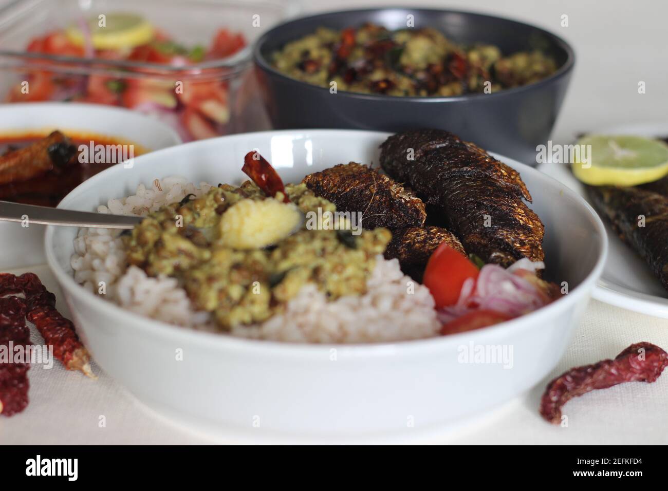 Sardis Rice Kerala meals with red rice, sardines curry, sardine fry and coconut ...