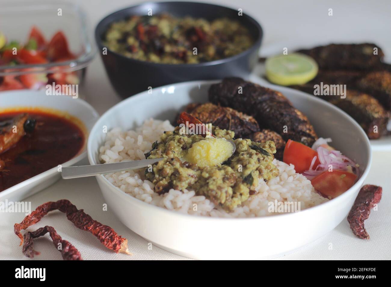 Sardis Rice Kerala meals with red rice, sardines curry, sardine fry and coconut ...