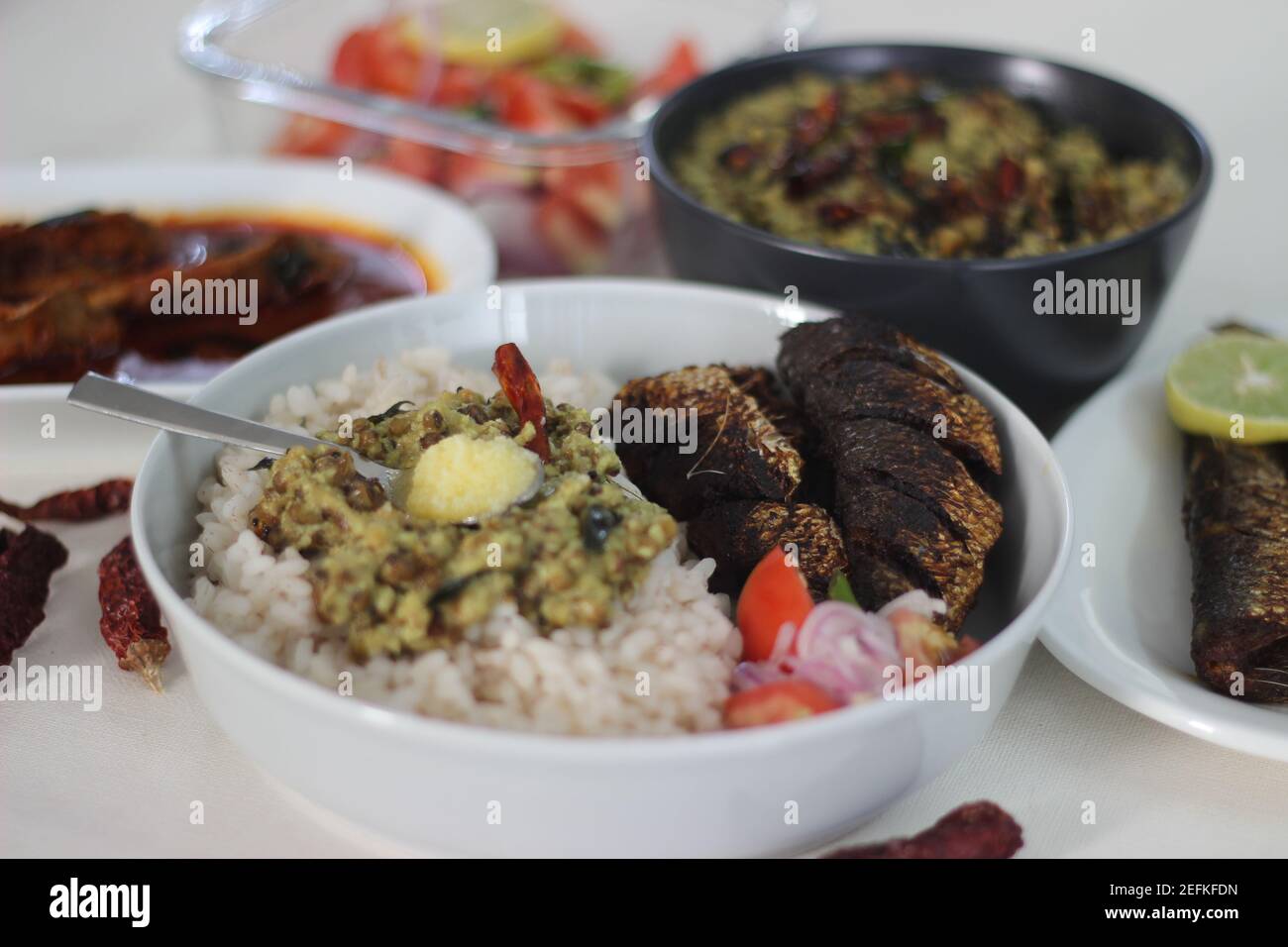 Sardis Rice Kerala meals with red rice, sardines curry, sardine fry and coconut ...