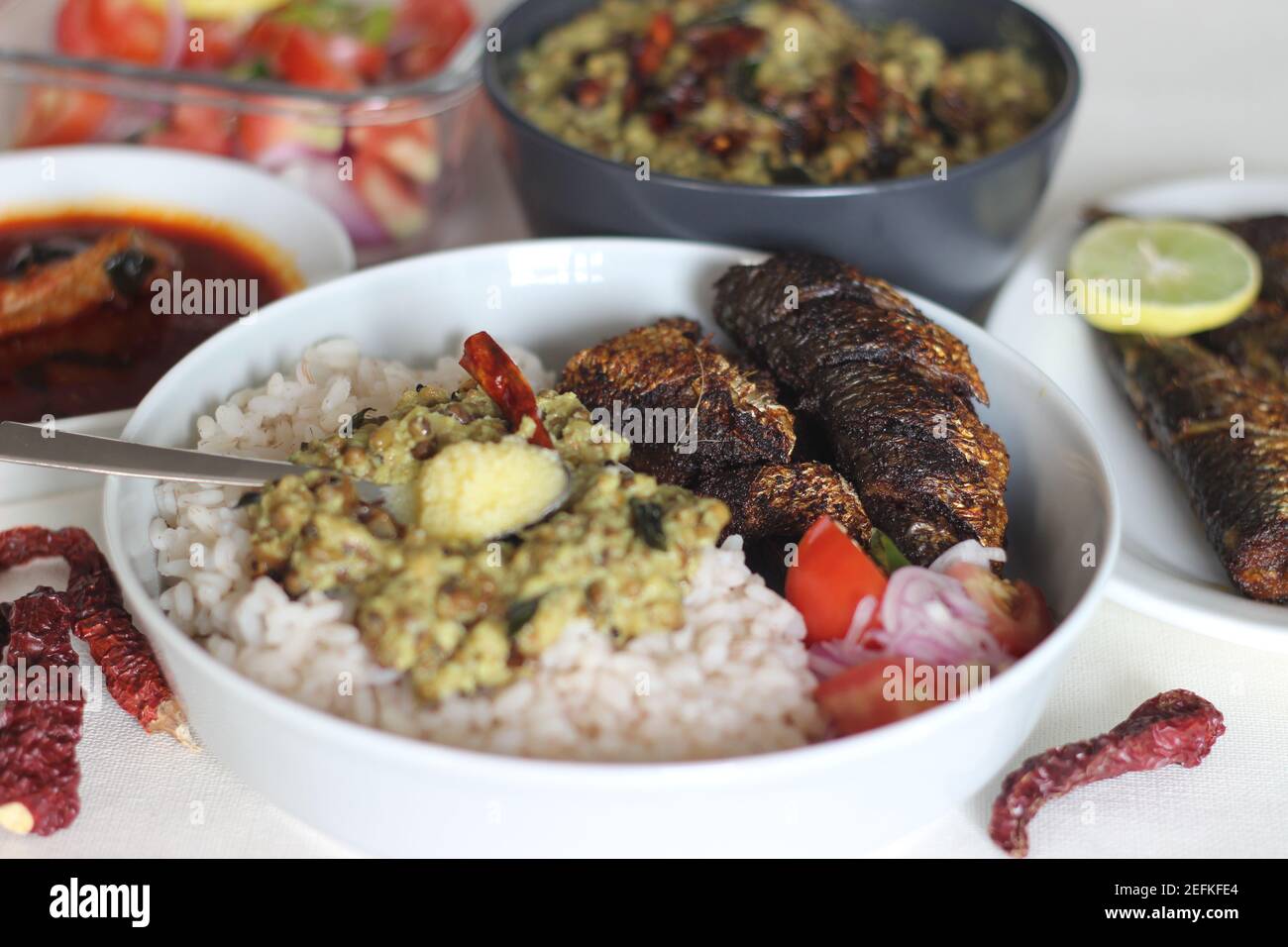 Sardis Rice Kerala meals with red rice, sardines curry, sardine fry and coconut ...