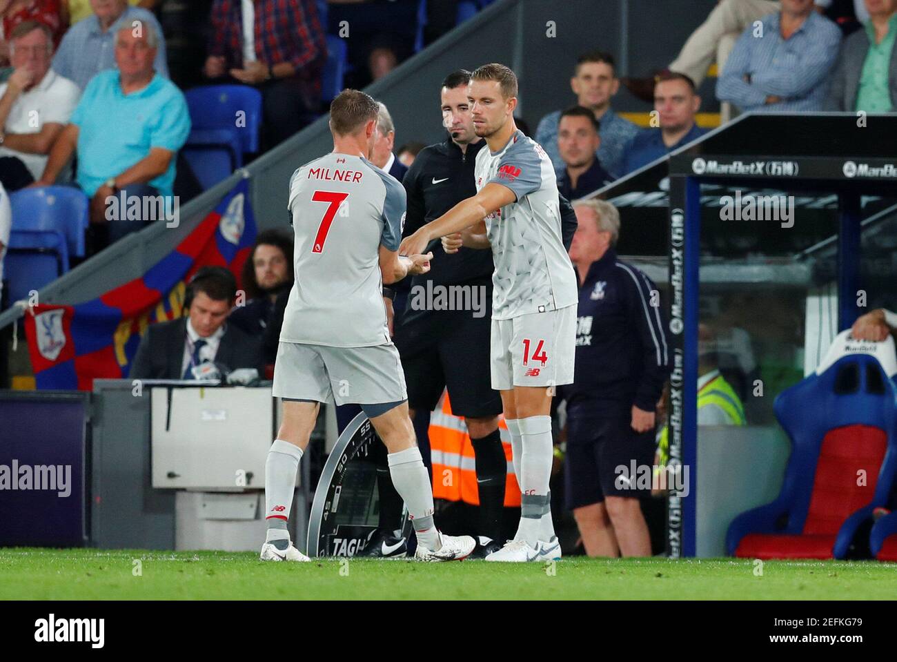 Soccer Football - Premier League - Crystal Palace v Liverpool - Selhurst Park, London, Britain - August 20, 2018 Liverpool's Jordan Henderson comes on as a substitute to replace James Milner REUTERS/Eddie Keogh EDITORIAL USE ONLY. No use with unauthorized audio, video, data, fixture lists, club/league logos or "live" services. Online in-match use limited to 75 images, no video emulation. No use in betting, games or single club/league/player publications. Please contact your account representative for further details. Stock Photo