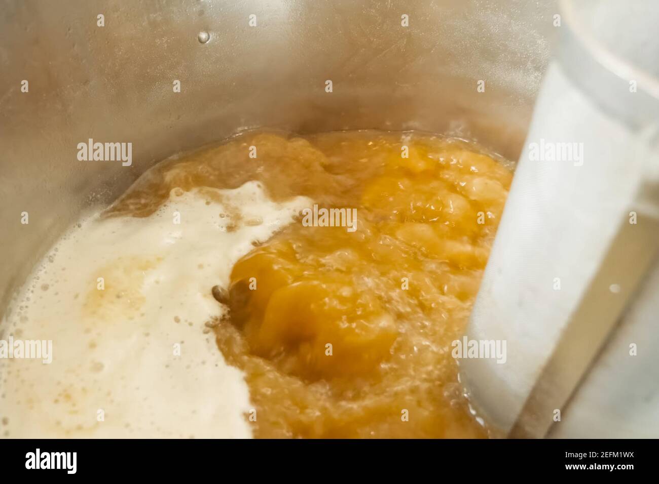 Brewing beer in a boiler. Boiling beer Stock Photo Alamy