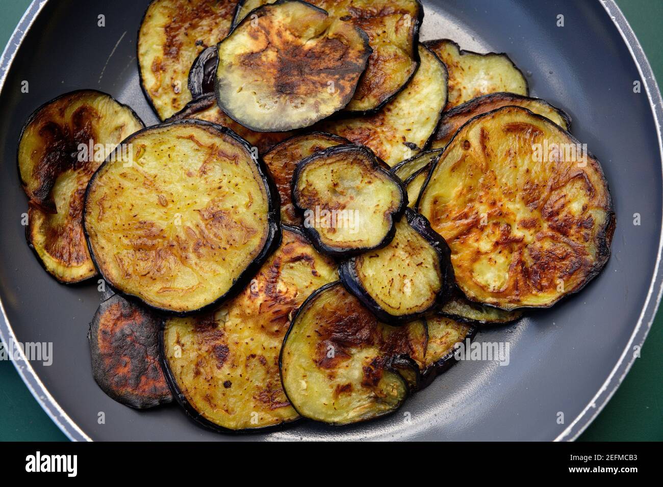 roasted eggplants in a pan Stock Photo