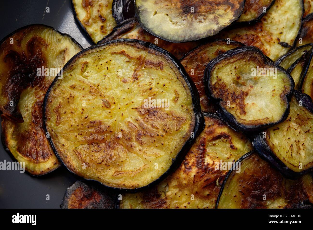 roasted eggplants in a pan Stock Photo