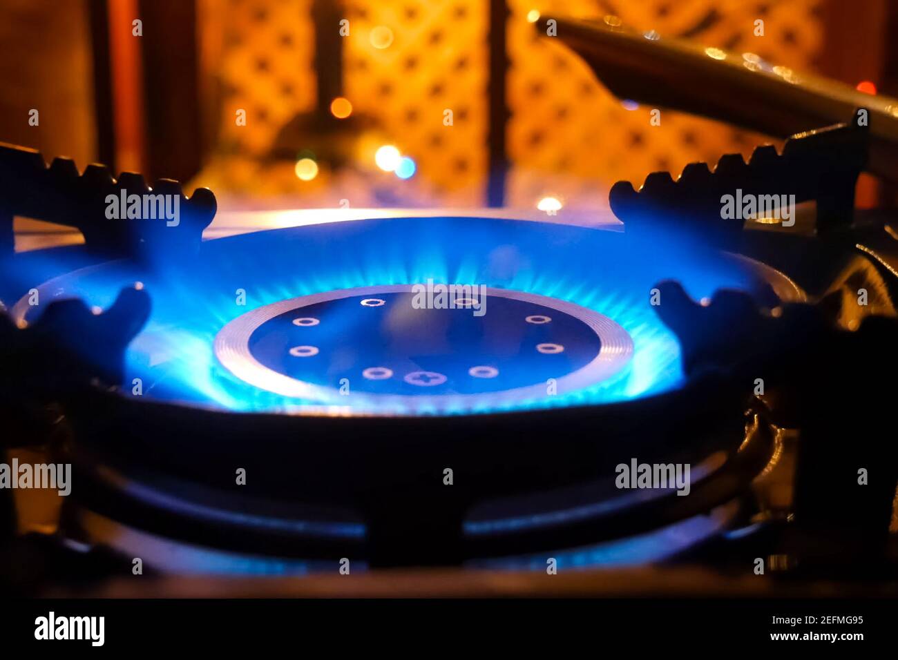 Burning gas stove. Blue flame of a gas burner Stock Photo Alamy