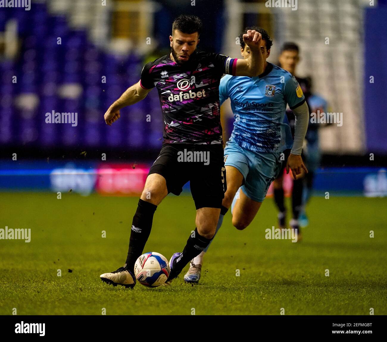 St Andrews Stadium, Coventry, West Midlands, England. 17th February 2021: ; English Football League Championship Football, Coventry City v Norwich City; Grant Hanley of Norwich City passes the ball back to his keeper Credit: Action Plus Sports Images/Alamy Live News Stock Photo