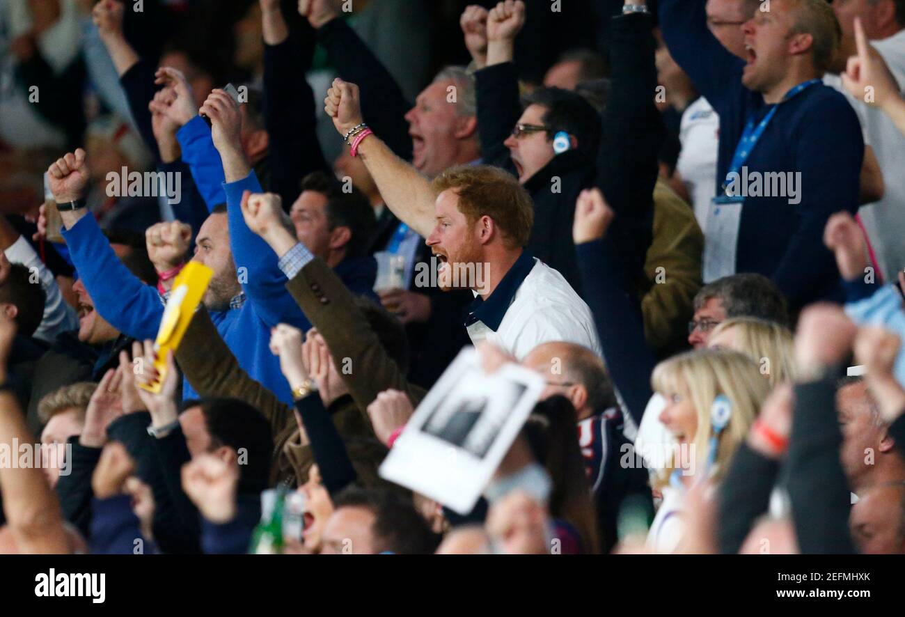 Rugby Union - England v Wales - IRB Rugby World Cup 2015 Pool A - Twickenham Stadium, London, England - 26/9/15  Britain's Prince Harry celebrates in the stands  Reuters / Andrew Winning  Livepic Stock Photo