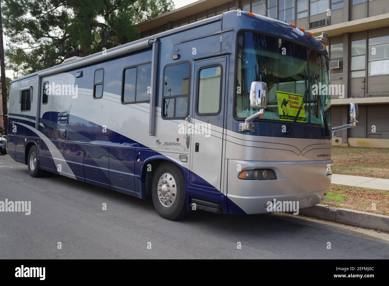 A recreational vehicle, RV, repurposed for political campaign transport ...