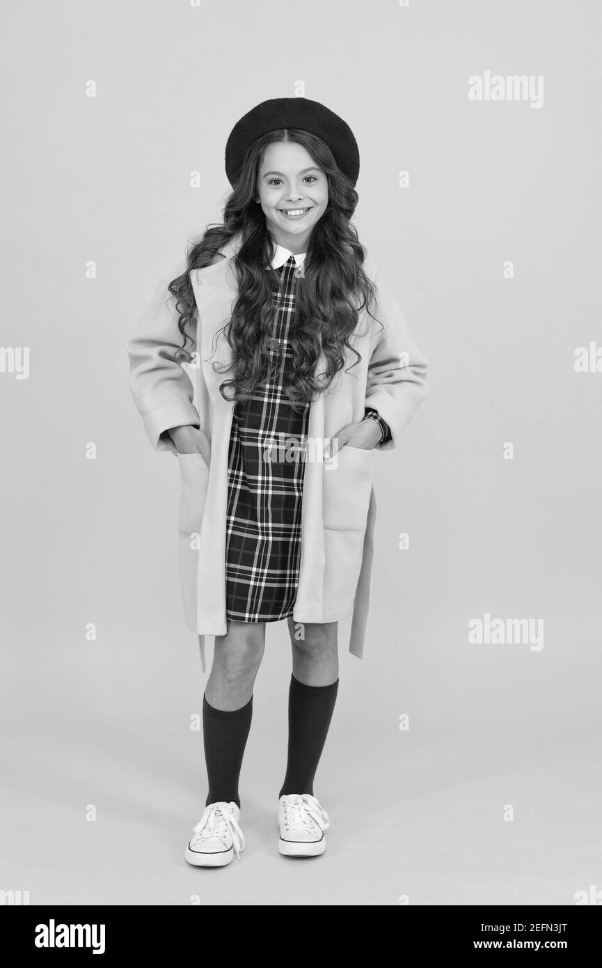 Girl wearing yellow raincoat Black and White Stock Photos Images