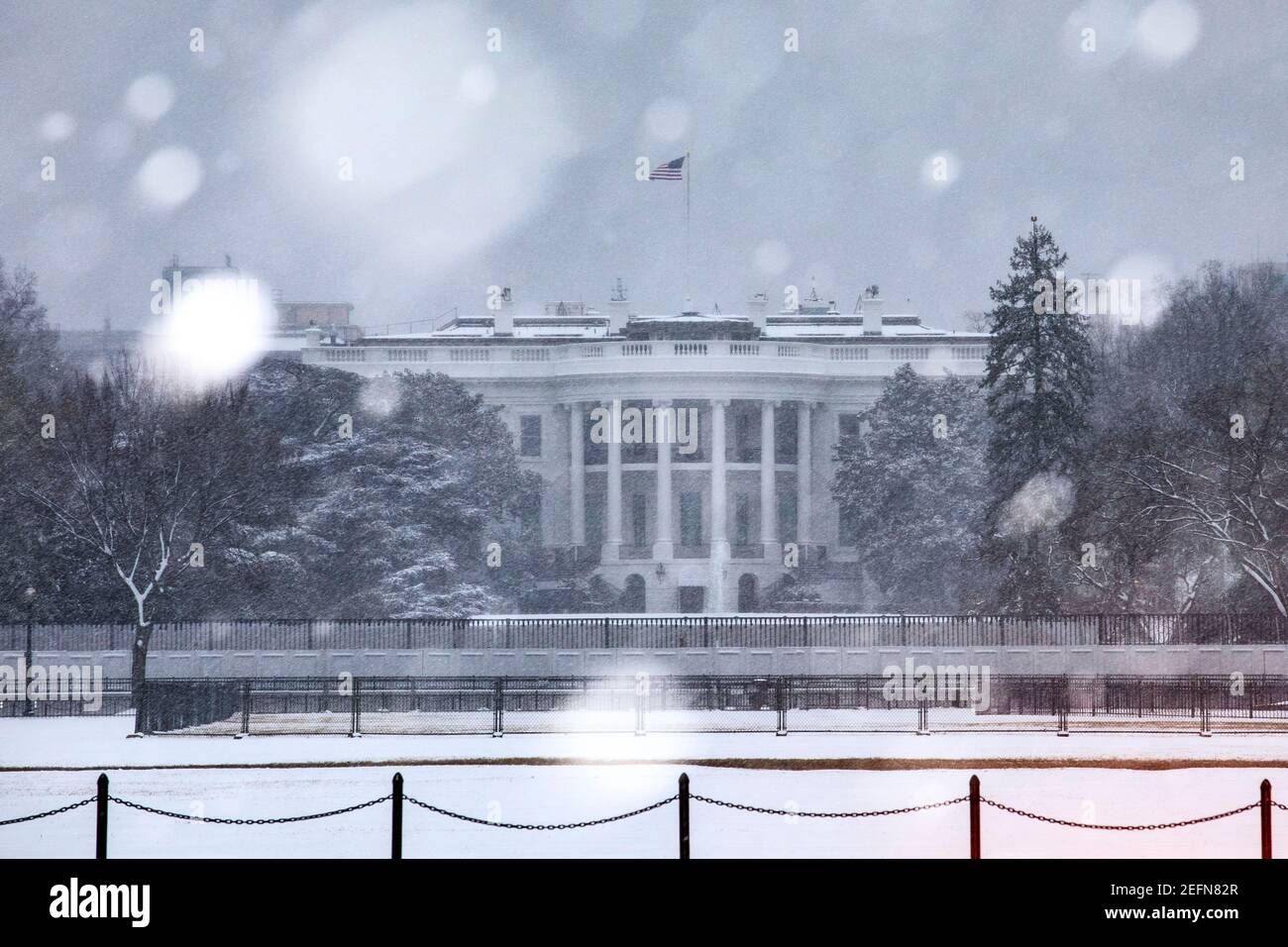 Snow blankets the South Lawn of the White House in Washington, DC. Stock Photo