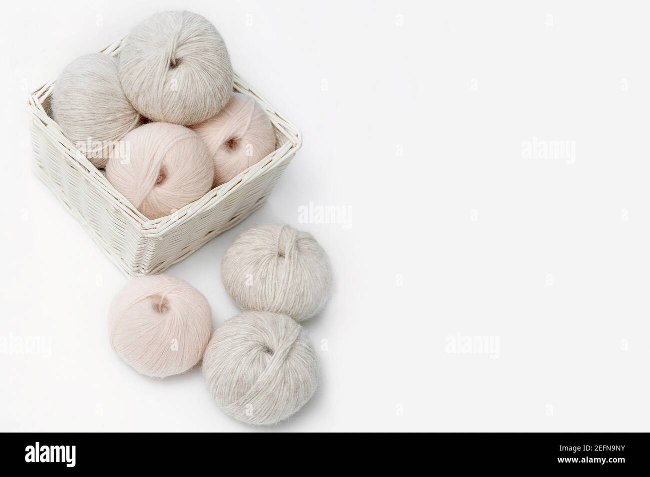 Still life with a selection of pastel color knitting wool yarn Stock