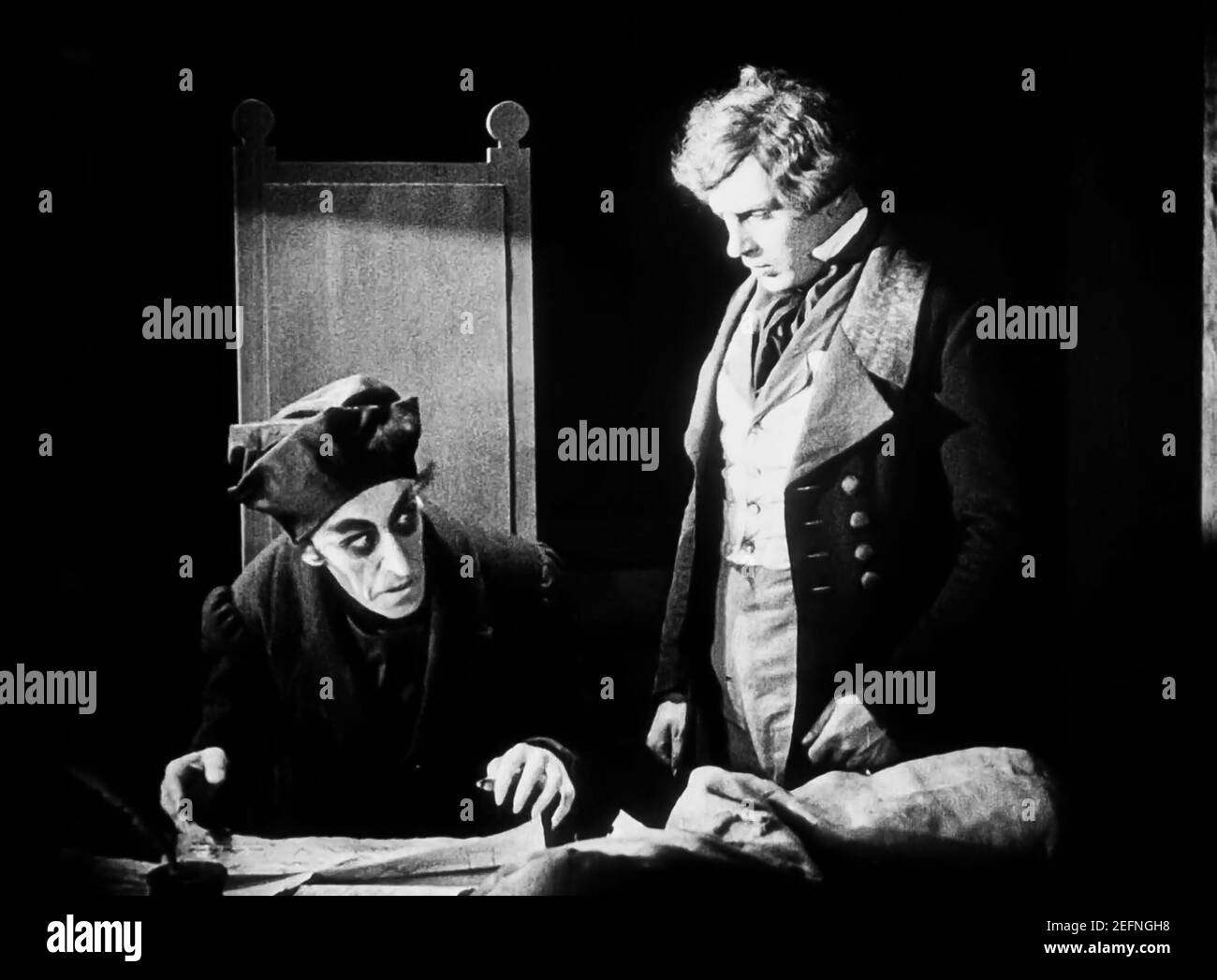 Max Schreck and Gustav von Wangenheim in a scene from the (C)Film Arts  Guild film : Nosferatu (1922). Plot: Vampire Count Orlok expresses interest  in a new residence and real estate agent