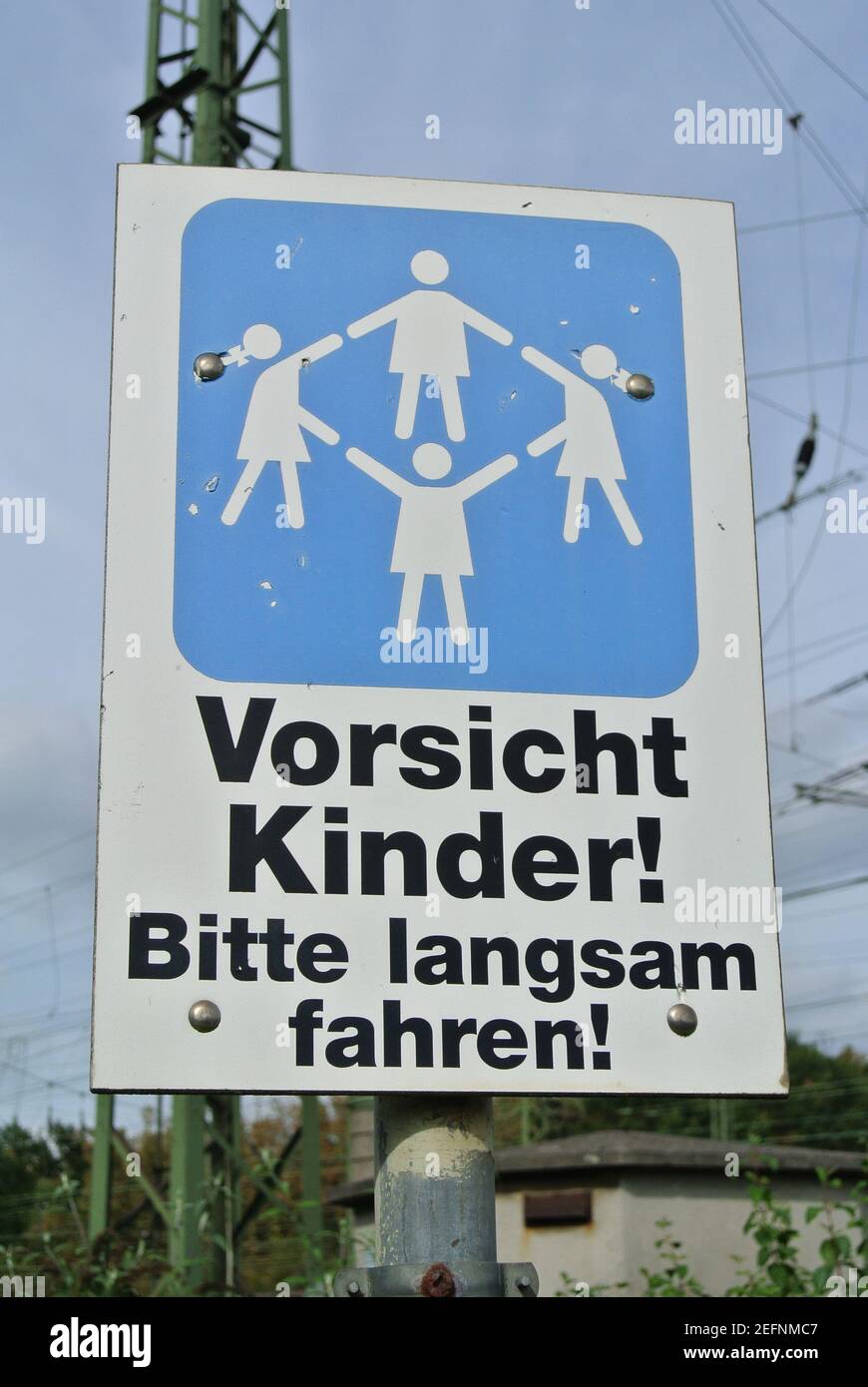 A German warning sign stating ' Caution Children please drive slowly ', Cologne, Germany, Europe. Stock Photo