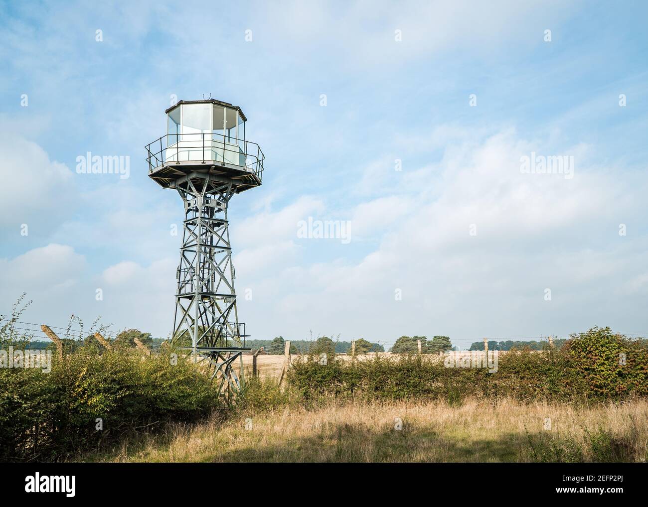 Cold War steel British military lookout tower with glass windows based at decommissioned abandoned old nuclear weapons site Stock Photo