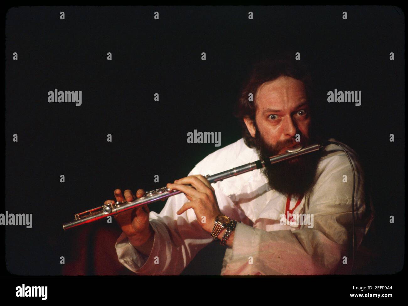 Singer Ian Anderson of Jethro Tull playing the flute (1981) Stock Photo