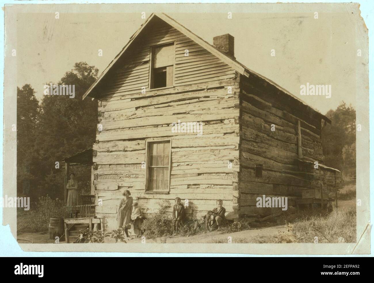 Old Log Cabin, the home of Wm. Mullens and family, near Charleston, W