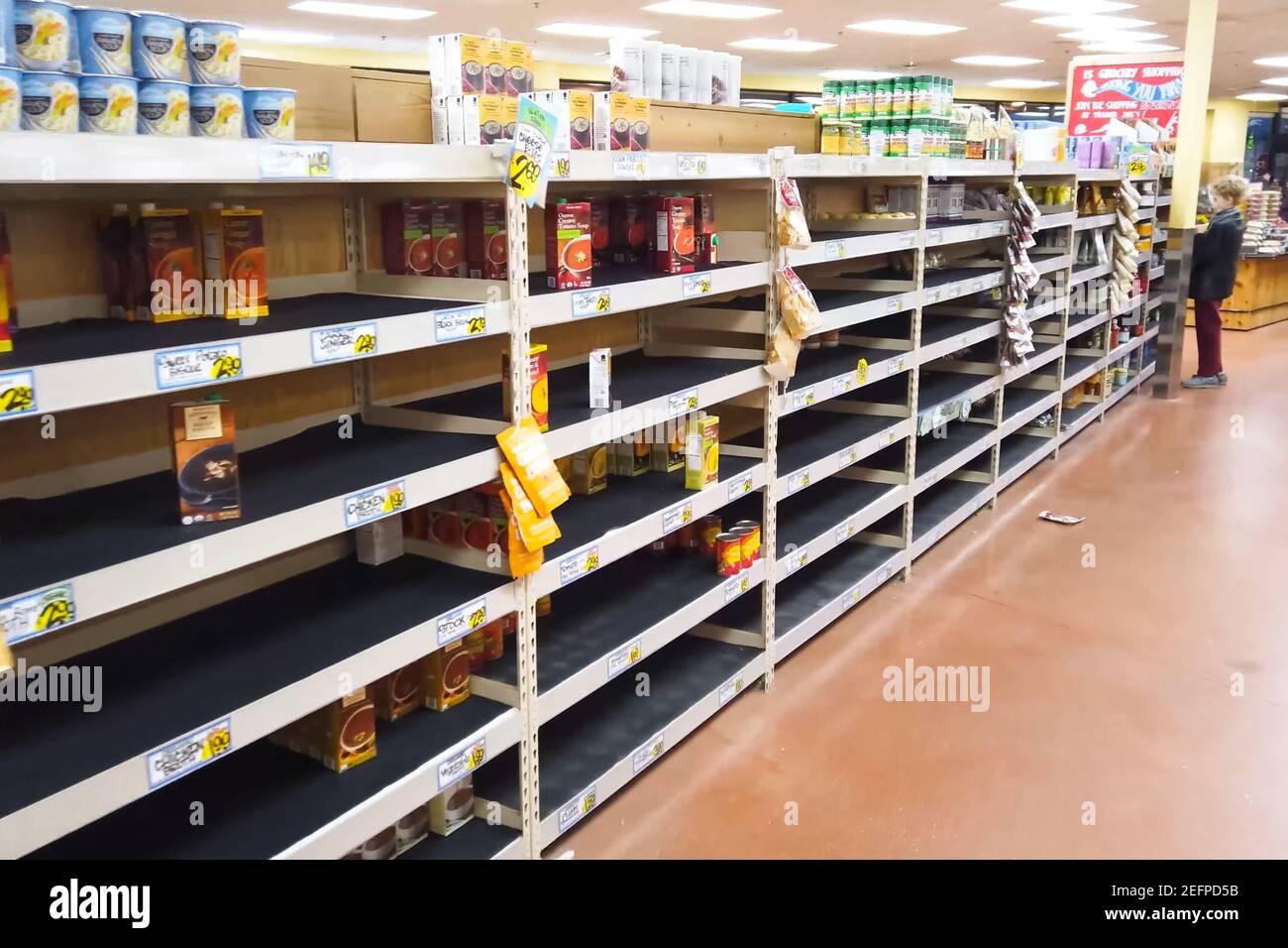 New York, USA - April 2, 2020: Empty shelves with groceries in supermarkets because of the panic from the coronavirus. Stock Photo