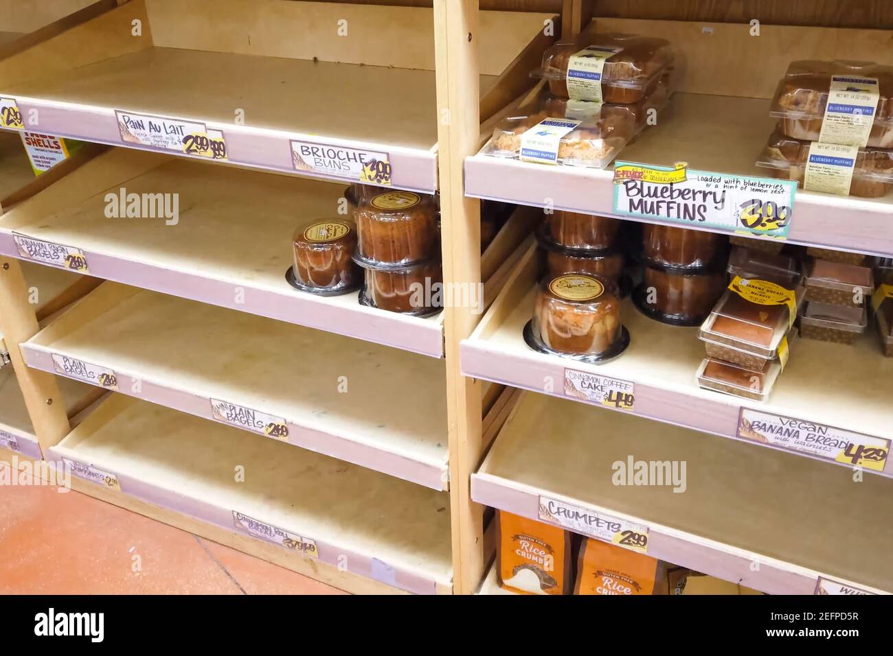 New York, USA - April 2, 2020: Empty shelves with groceries in supermarkets because of the panic from the coronavirus. Stock Photo