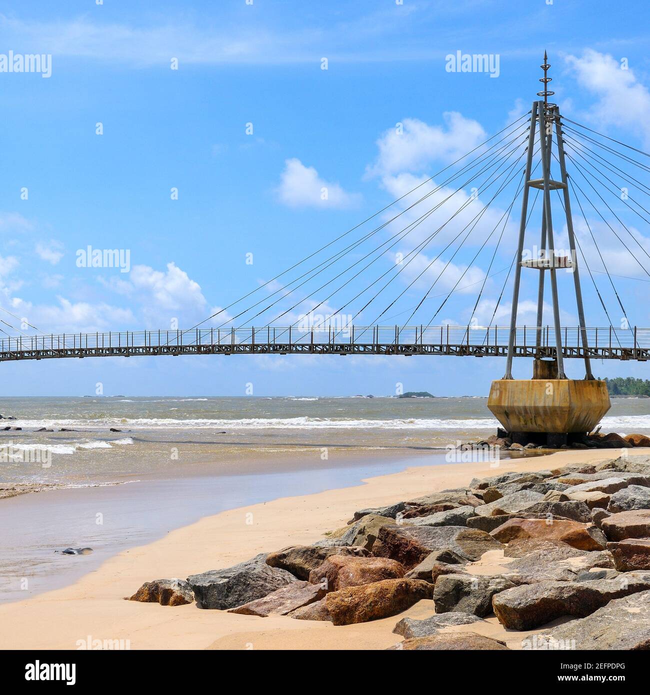 Modern pedestrian bridge on an island in the ocean. Matara. Sri Lanka ...