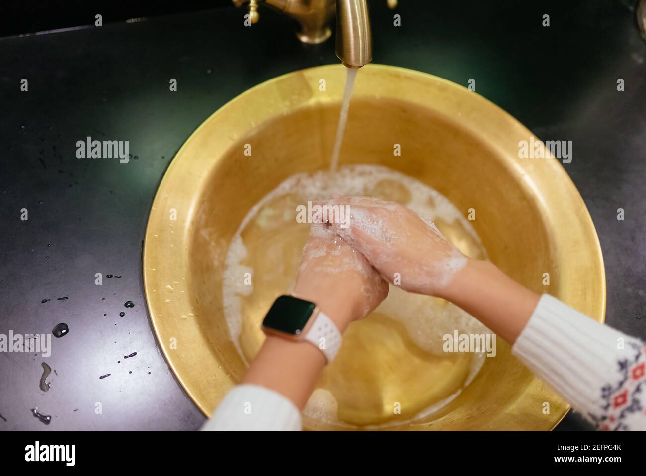 Close up photo of woman washes her hands with soap and water Stock ...
