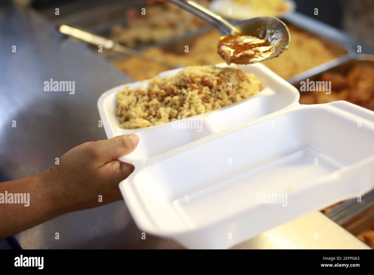 Pouring rice container hi-res stock photography and images - Alamy
