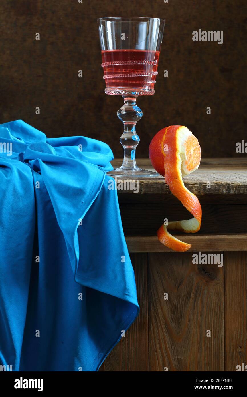 Still life with red wine and citrus Stock Photo - Alamy