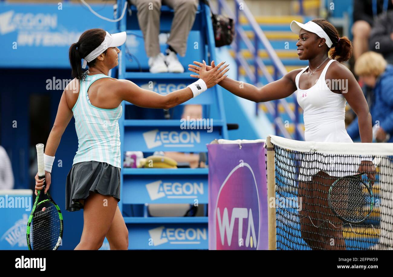 Tennis - Aegon International - Devonshire Park, Eastbourne - 24/6/15  USA's Sloane Stephens shakes hands with Great Britain's Heather Watson after winning their third round match  Action Images via Reuters / Henry Browne  Livepic Stock Photo