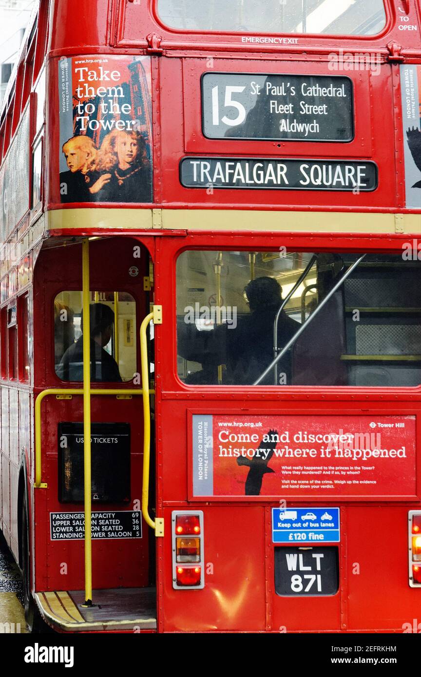 The back of a red Routemaster london bus going to Trafalgar Square via St Pauls Cathedral, Fleet Street and Aldwych Stock Photo