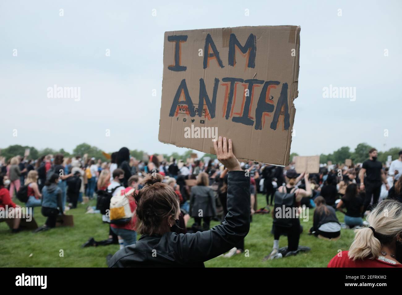 LONDON - 3RD JUNE 2020: Black Lives Matter protest on Speakers Corner in London. A lady holds a sign saying 'I am Antifa' Stock Photo