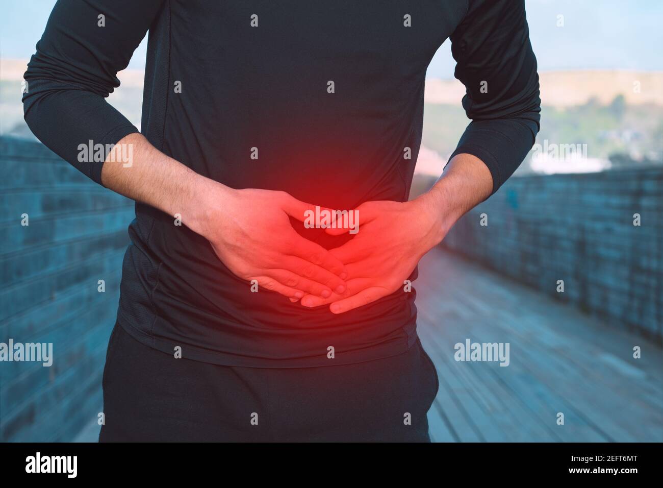 Stomach side stitch or cramps during running. Athlete suffering from