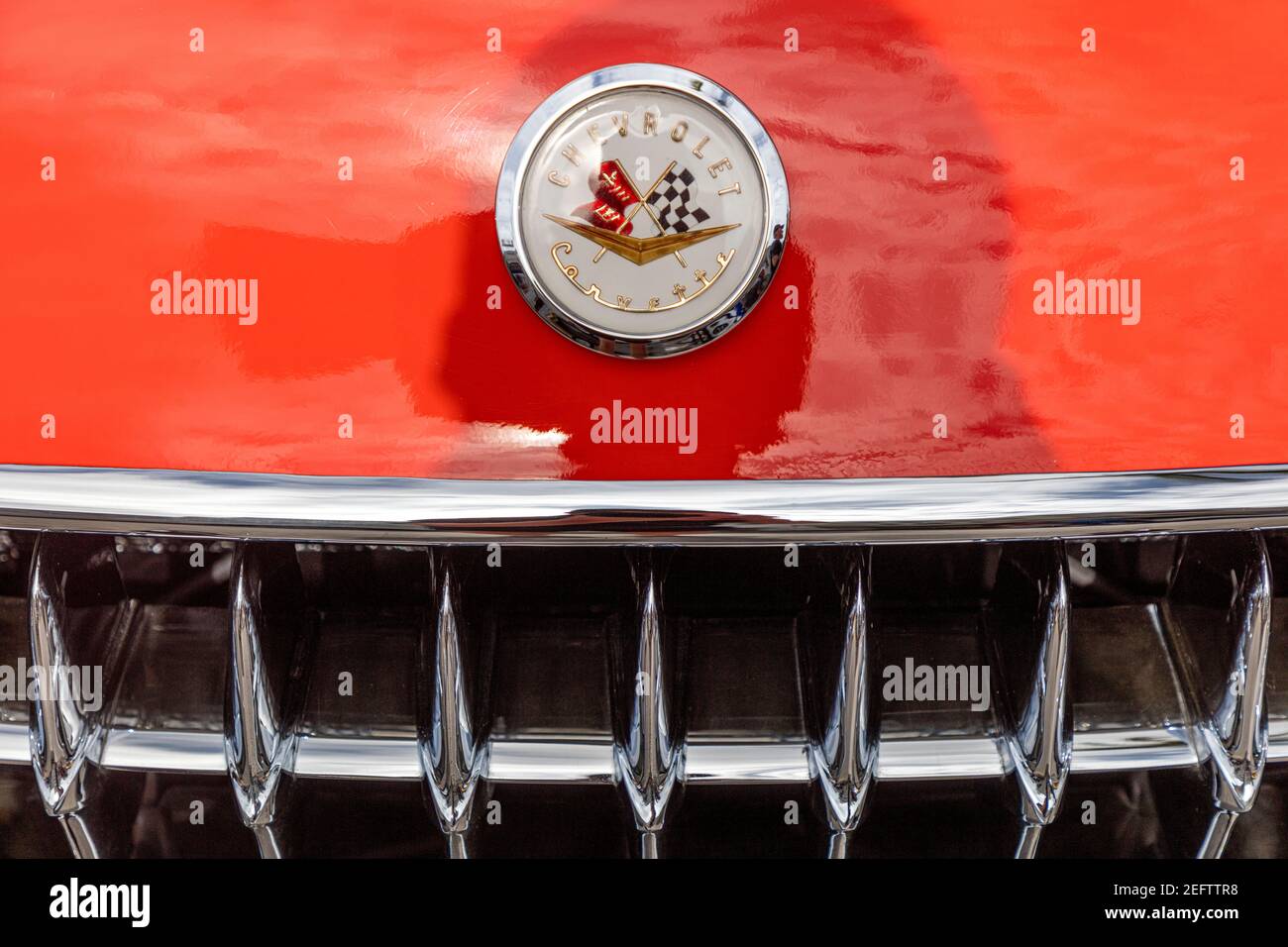 1957 orange Chevrolet Corvette hood emblem on display at 'Cars on Fifth' - Naples, Florida, USA Stock Photo