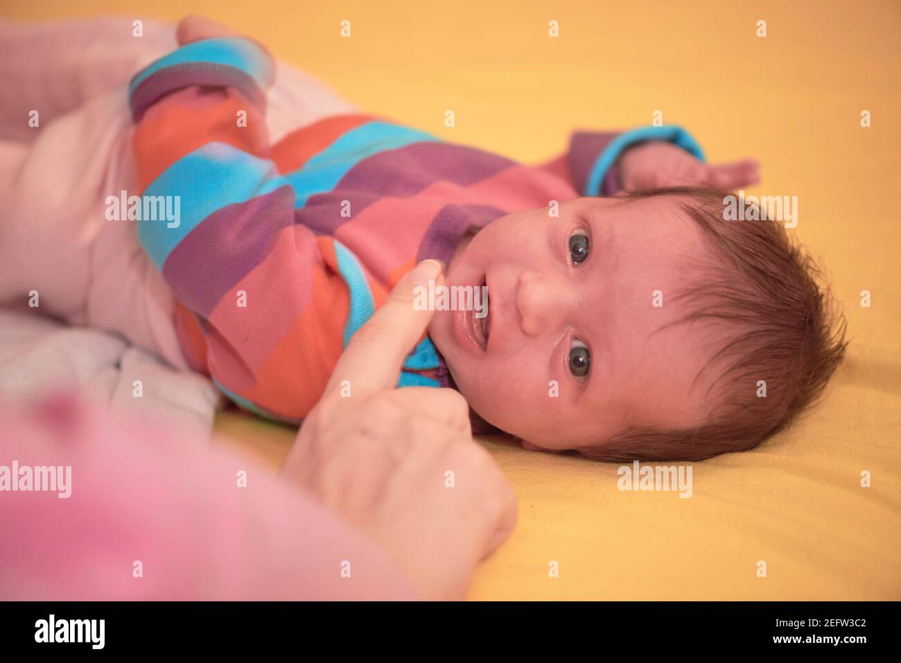 One month newborn baby sleeping in bed Stock Photo Alamy