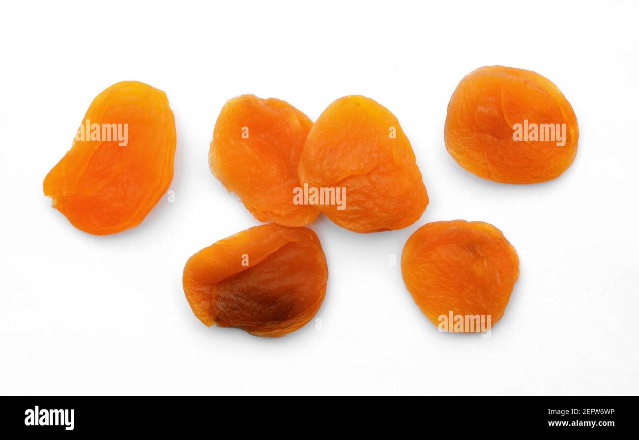 Dried apricots isolated on white background Stock Photo - Alamy