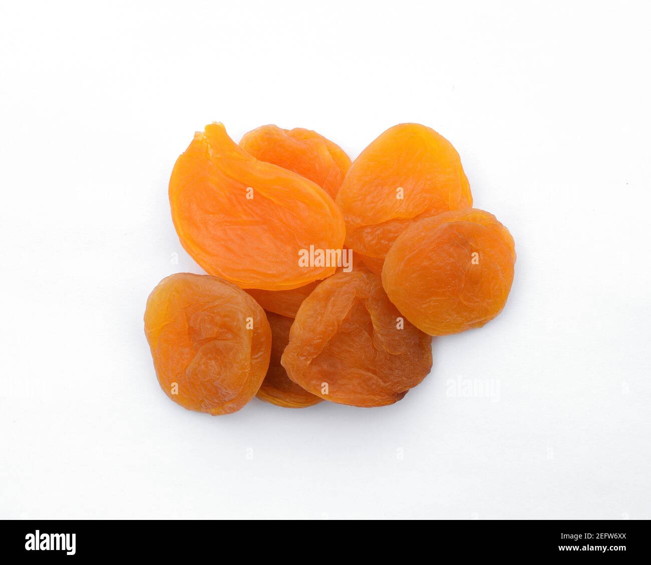 Dried apricots isolated on white background Stock Photo - Alamy