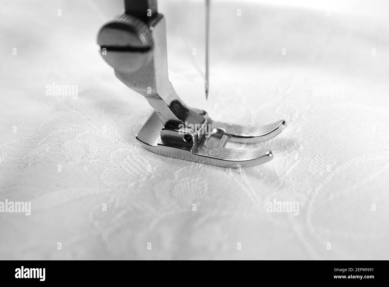 Sewing machine. Closeup the sewing machine and item of clothing Stock