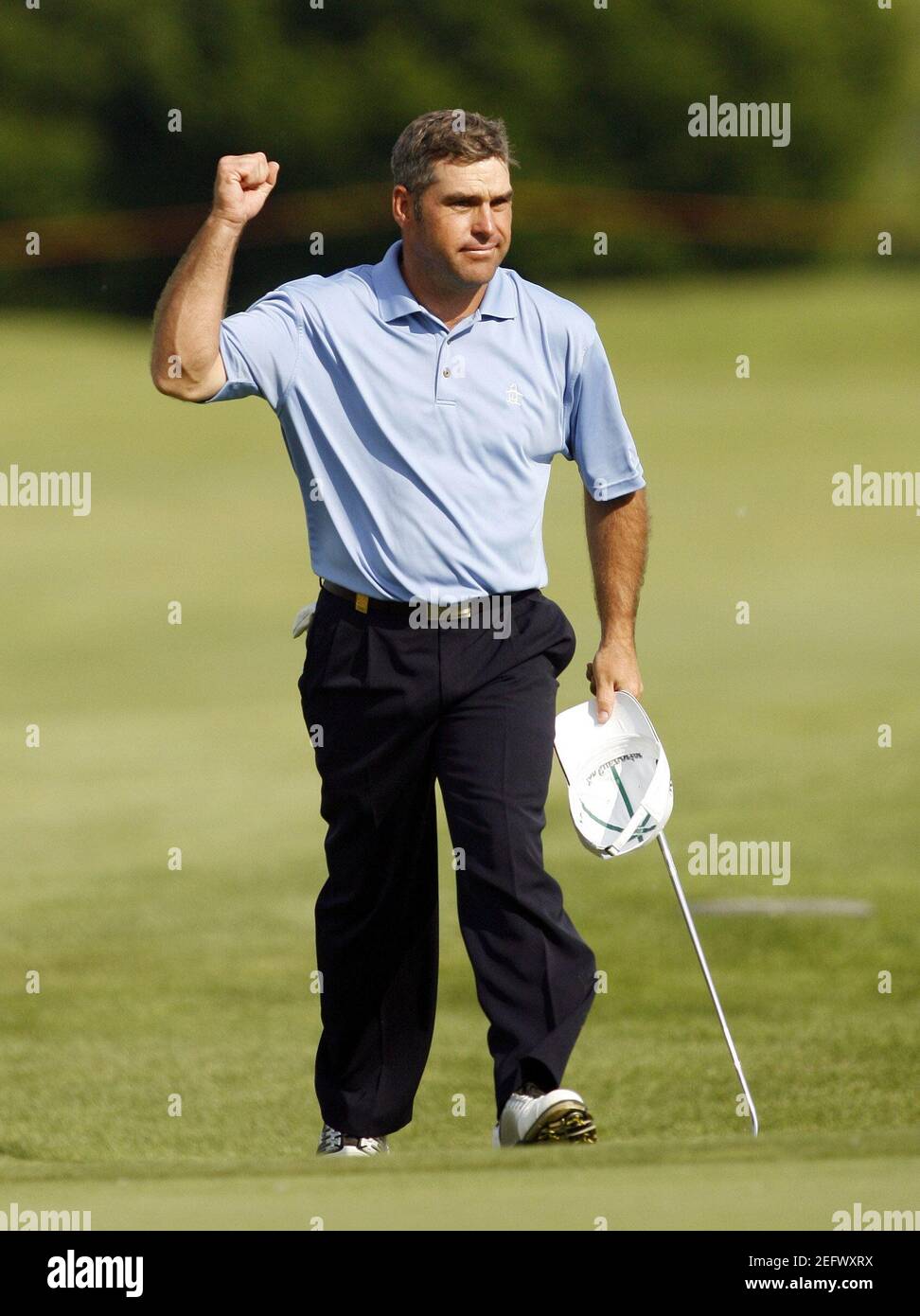 Golf - Italian Open - Castello di Tolcinasco Golf & Country Club, Milan,  Italy - 11/5/08 South Africa's Hennie Otto celebrates as he walks up the  18th fairway during the final round