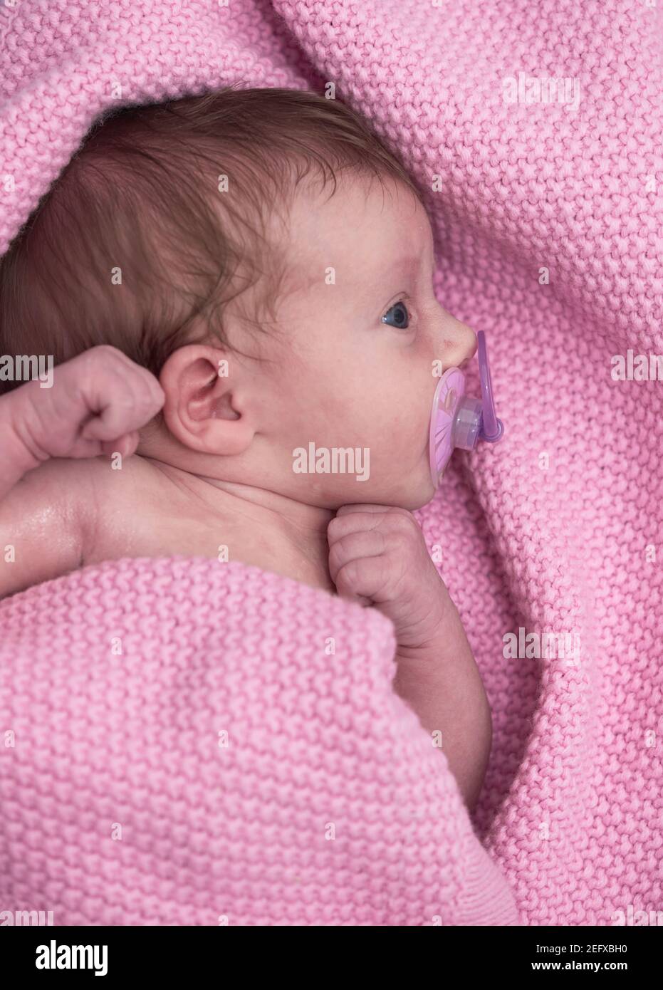 One month newborn baby sleeping in bed Stock Photo Alamy