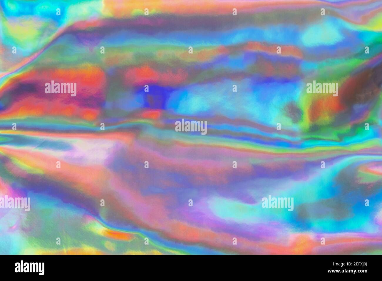 Iridescent neon background. Holographic wrinkled abstract foil texture ...